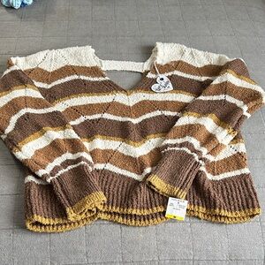 Cozy V-Neck Sweater in Brown, Cream, and Gold